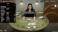 Blackjack strategy in live blackjack showing dealer, player hands, and side bet