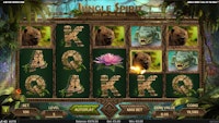 Jungle Spirit slot showing bear, crocodile, and lotus symbols across five reels.