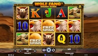 Wild desert-themed Wolf Fang slot machine with Free Spins trigger.