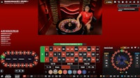 Roulette Macao live casino game with a dealer spinning the wheel in a casino studio.