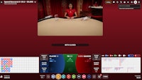 Live Speed Baccarat 6 interface with dealer and bet summary on virtual red table.