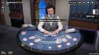 Speed Blackjack 2 dealer reveals hand, showing player chip values and final cards