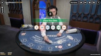 Speed Blackjack 2 table with dealer in play and betting chips on display.